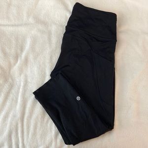 black lululemon fast and free high rise crop 23” leggings.